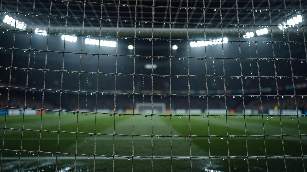 Goal net close-up with rain drops on the mesh